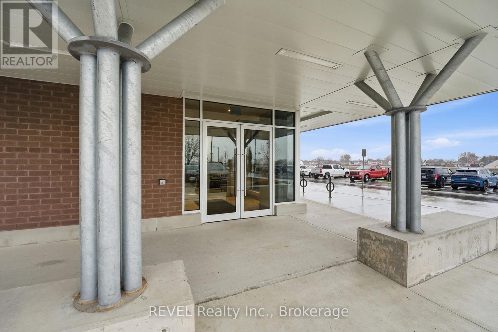 203 - 118 West Street, Port Colborne (Sugarloaf), ON - Outdoor With Exterior