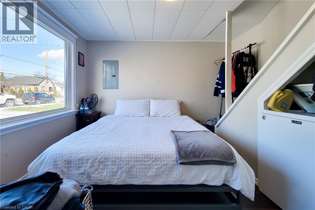 Bedroom with electric panel - 558 Barnaby Street, Hamilton, ON - Indoor Photo Showing Bedroom