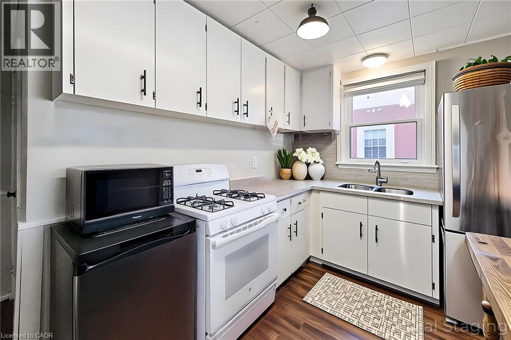 Virtual staging - 558 Barnaby Street, Hamilton, ON - Indoor Photo Showing Kitchen With Double Sink
