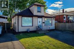 Bungalow with a shingled roof -