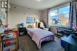 Bedroom featuring carpet flooring -