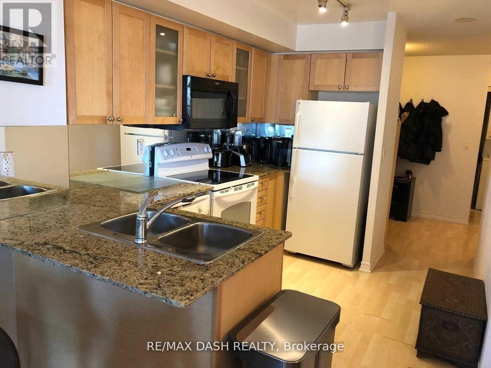 2210 - 761 Bay Street, Toronto, ON - Indoor Photo Showing Kitchen With Double Sink