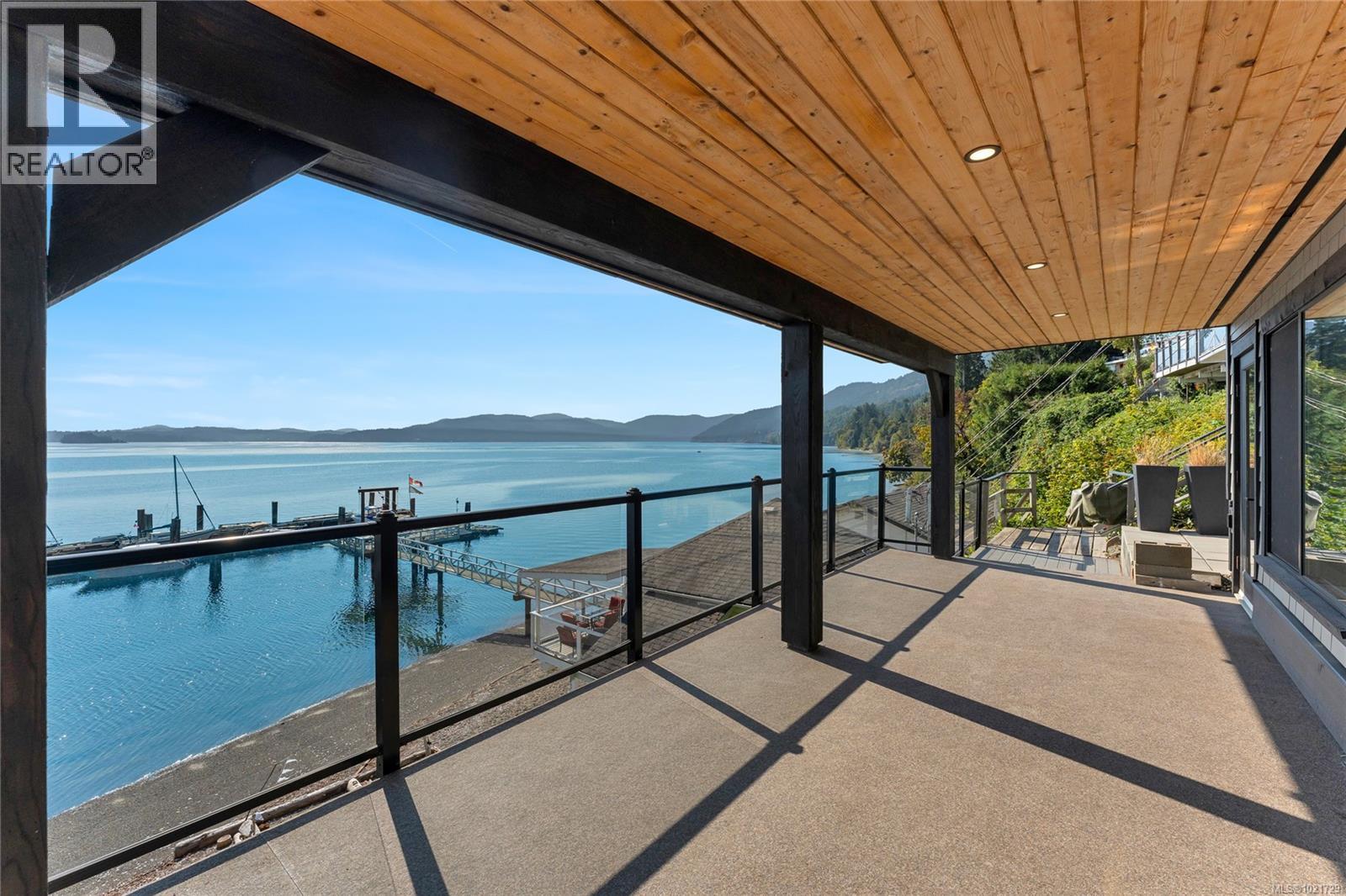 Covered lower deck with water views and ready access to dock - 4 1723 Sandy Beach Rd, Mill Bay, BC - Outdoor With Body Of Water With View With Exterior