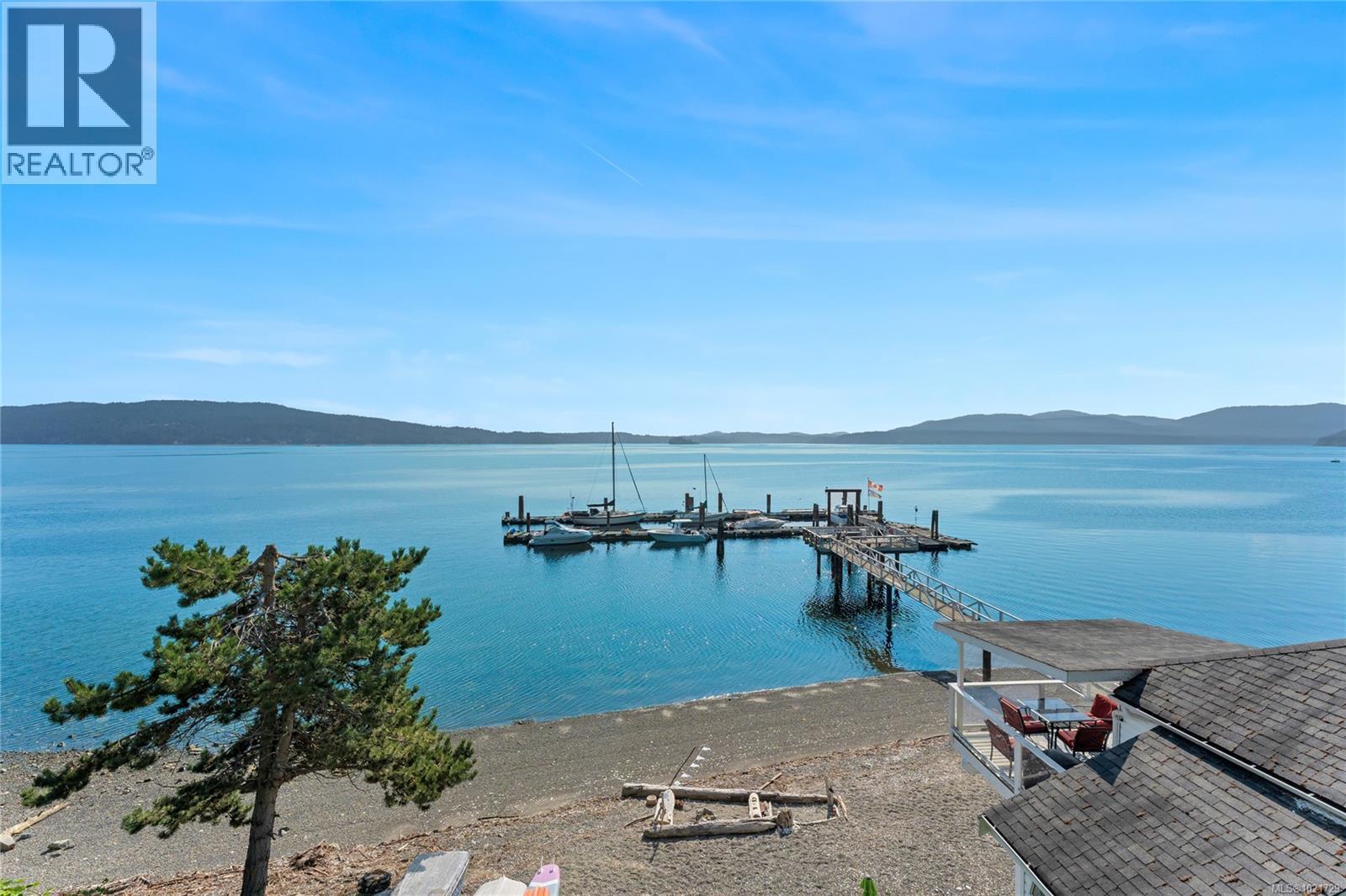 Communal dock includes space for Cottage 4 to keep a boat up to 25' - 4 1723 Sandy Beach Rd, Mill Bay, BC - Outdoor With Body Of Water With View