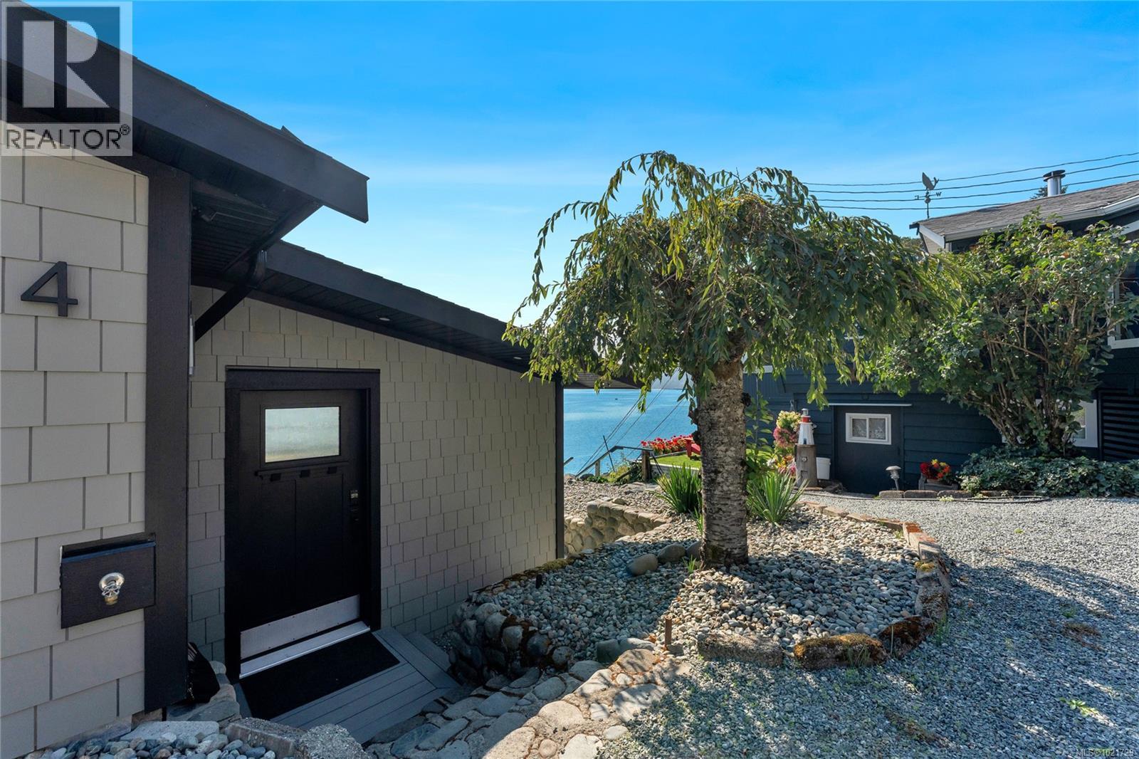 Front entry includes original dry-stack rock wall - 4 1723 Sandy Beach Rd, Mill Bay, BC - Outdoor