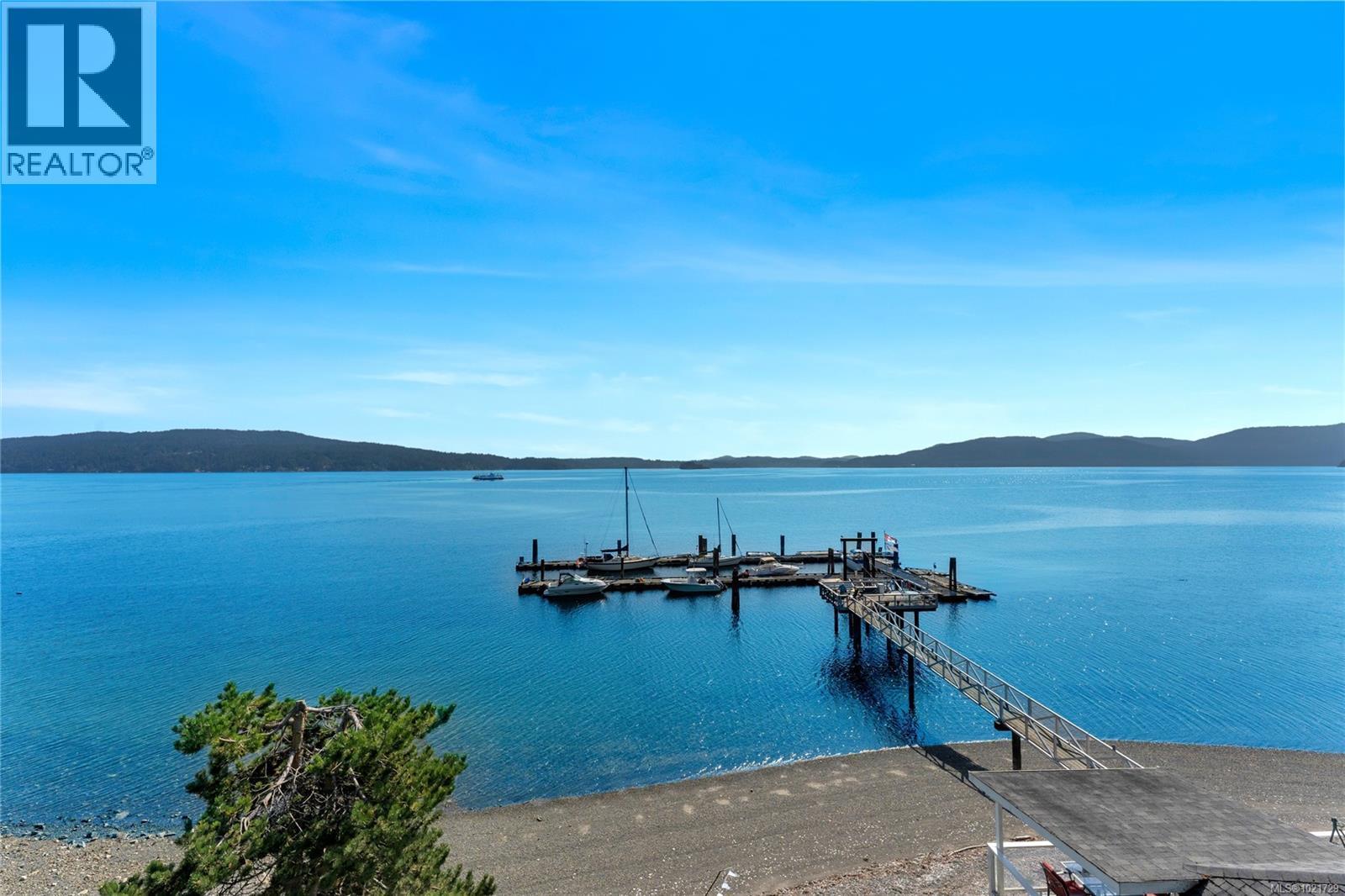 Sandy Beach community includes a private dock - 4 1723 Sandy Beach Rd, Mill Bay, BC - Outdoor With Body Of Water With View