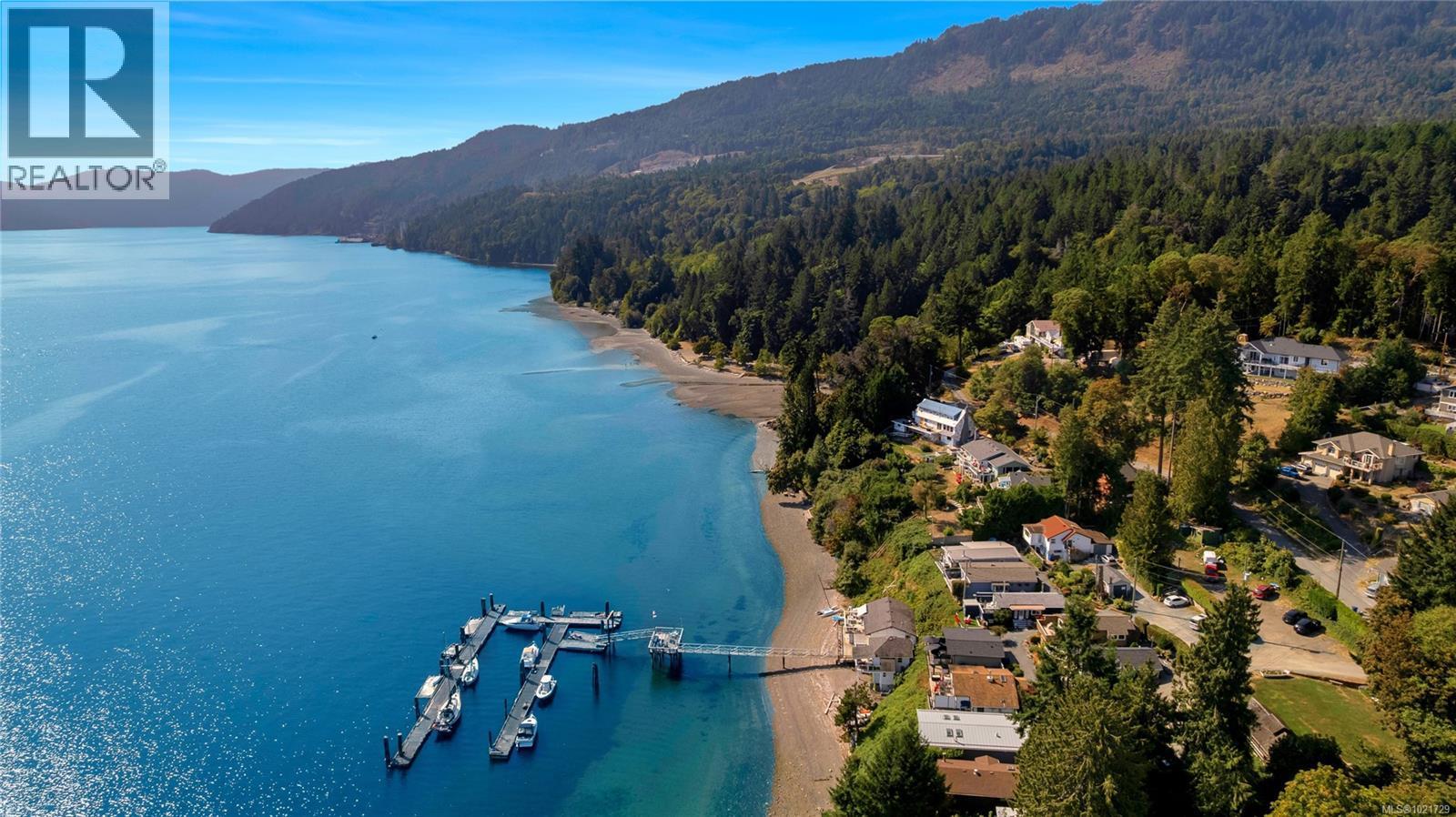 Aerial view of a water and mountain view - 4 1723 Sandy Beach Rd, Mill Bay, BC - Outdoor With Body Of Water With View