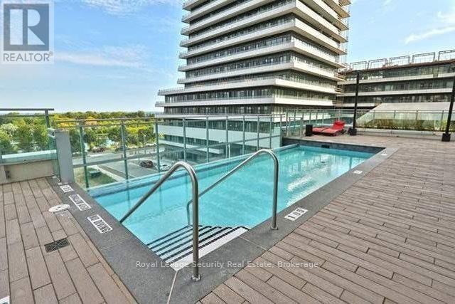 3206 - 33 Shore Breeze Drive, Toronto, ON - Outdoor With In Ground Pool