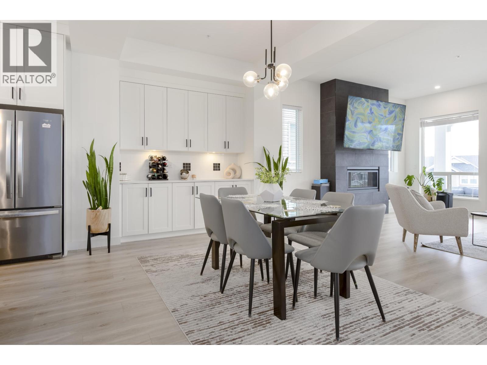 14112 Mier Drive, Maple Ridge, BC - Indoor Photo Showing Dining Room With Fireplace