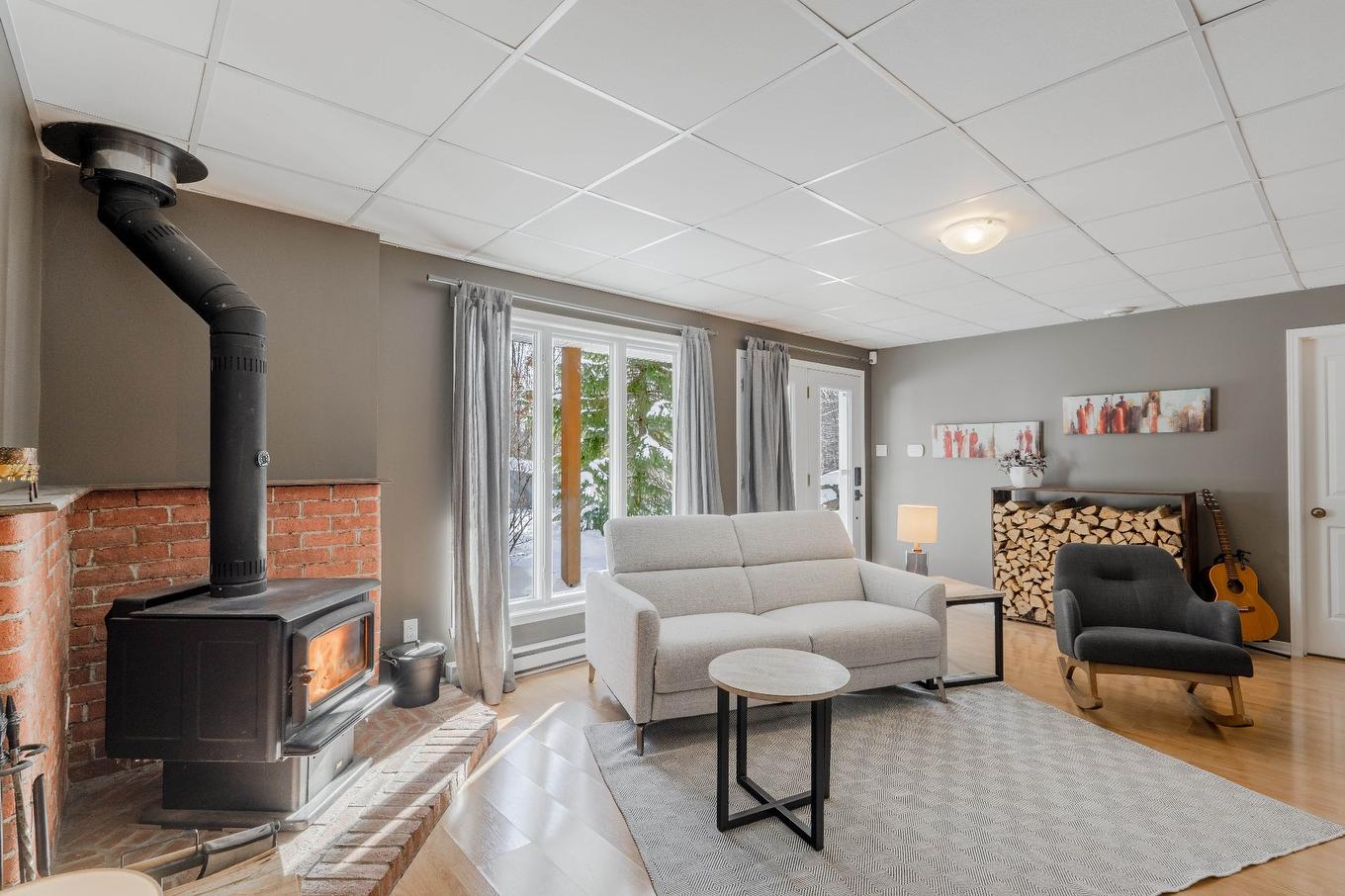 Family room - 2270 Ch. Deschesne, Saint-Denis-De-Brompton, QC - Indoor Photo Showing Living Room With Fireplace