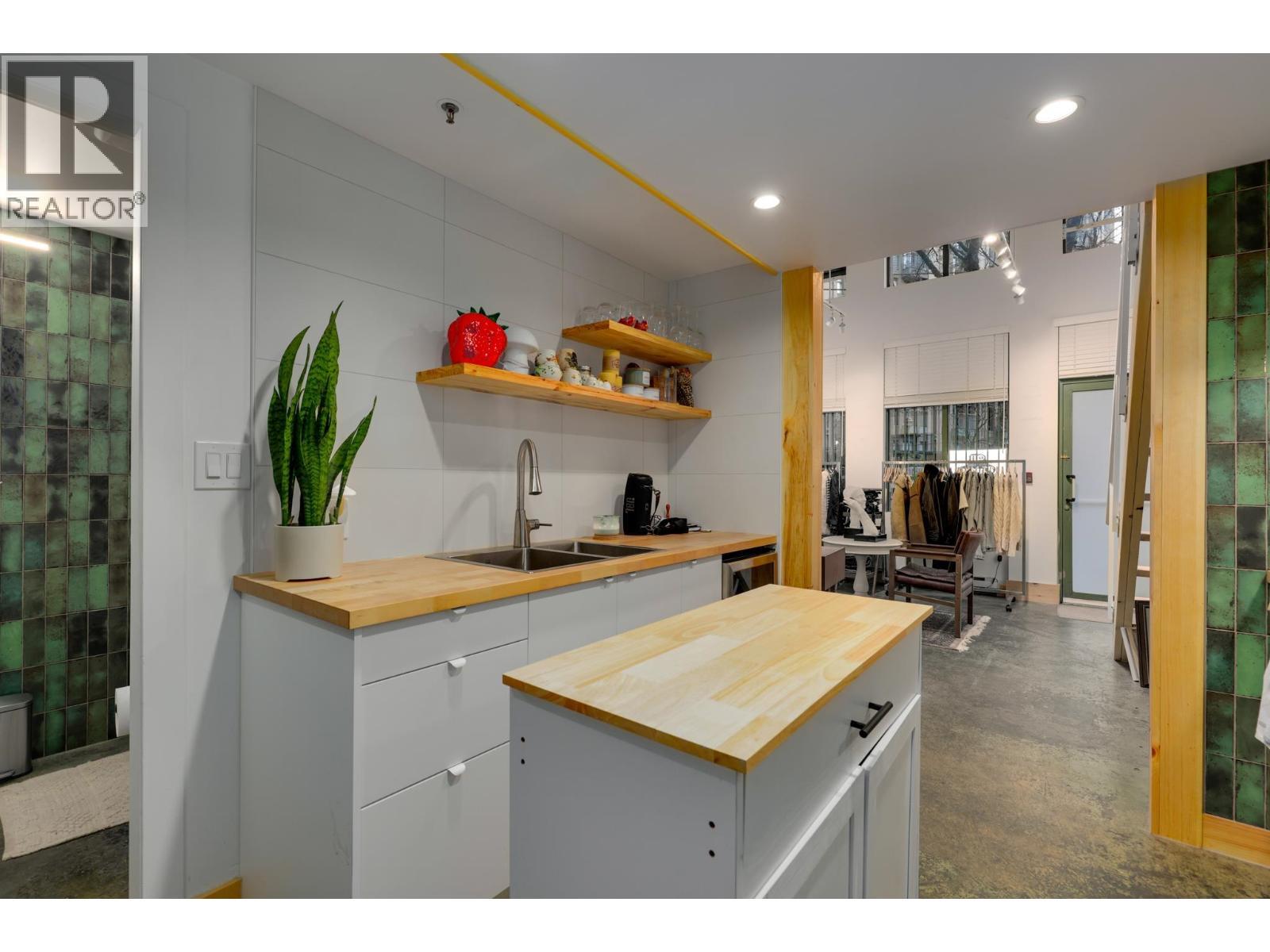 160 1 E Cordova Street, Vancouver, BC - Indoor Photo Showing Kitchen With Double Sink