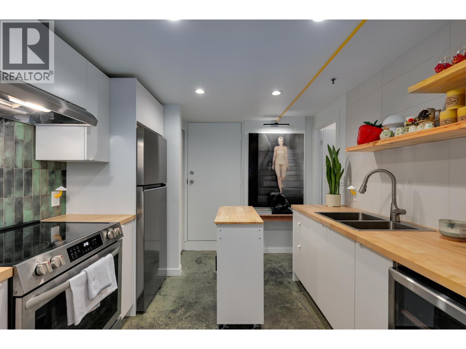 160 1 E Cordova Street, Vancouver, BC - Indoor Photo Showing Kitchen With Double Sink