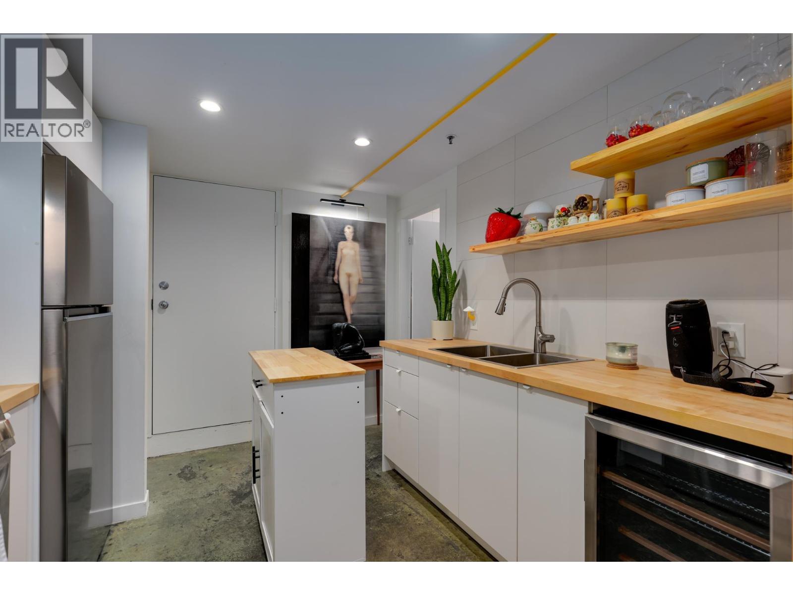 160 1 E Cordova Street, Vancouver, BC - Indoor Photo Showing Kitchen With Double Sink