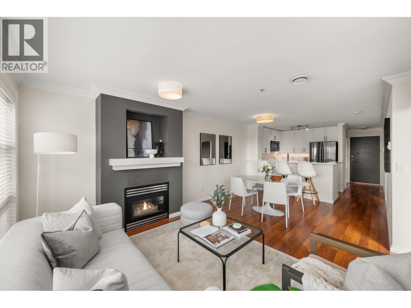 301 124 W 3Rd Street, North Vancouver, BC - Indoor Photo Showing Living Room With Fireplace