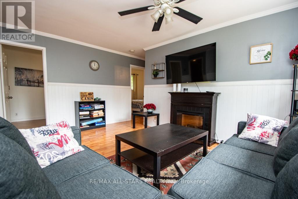 31 Morrison Street, Kawartha Lakes (Laxton/Digby/Longford), ON - Indoor Photo Showing Living Room With Fireplace