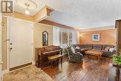 Front entrance to large living room -