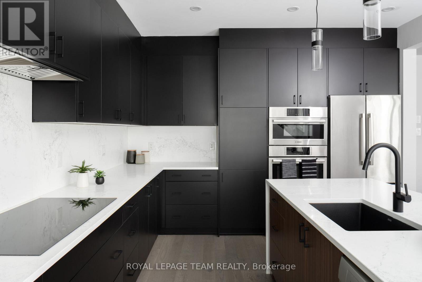 Images provided are to showcase builder finishes - 919 Finescale Way, Ottawa, ON - Indoor Photo Showing Kitchen With Upgraded Kitchen