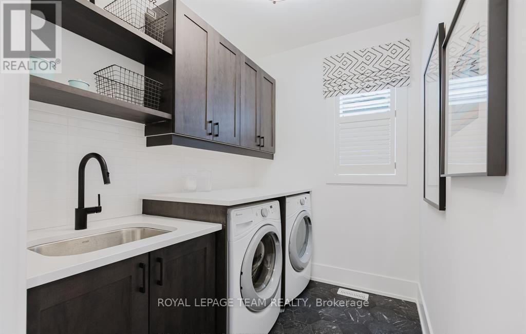 Images provided are to showcase builder finishes - 919 Finescale Way, Ottawa, ON - Indoor Photo Showing Laundry Room