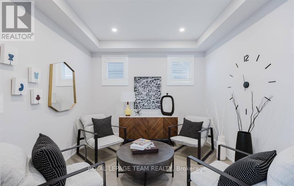 Images provided are to showcase builder finishes - 919 Finescale Way, Ottawa, ON - Indoor Photo Showing Living Room