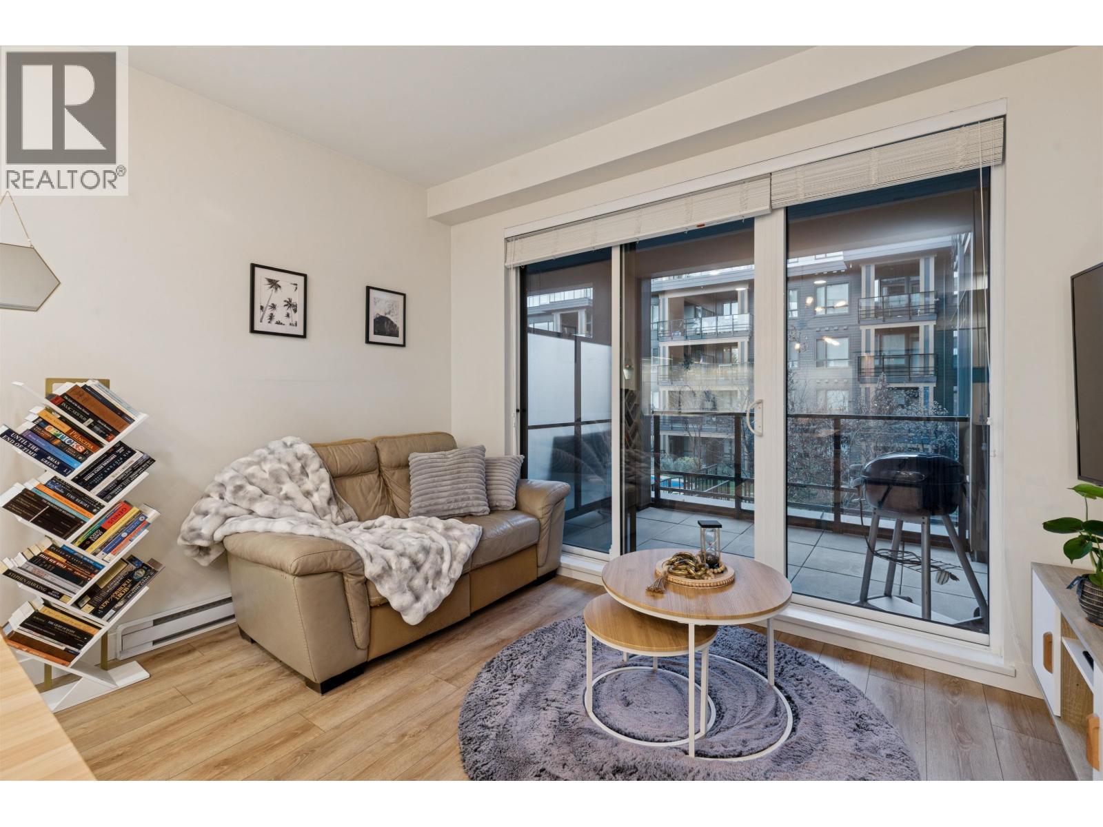 225 721 Anskar Court, Coquitlam, BC - Indoor Photo Showing Living Room With Fireplace