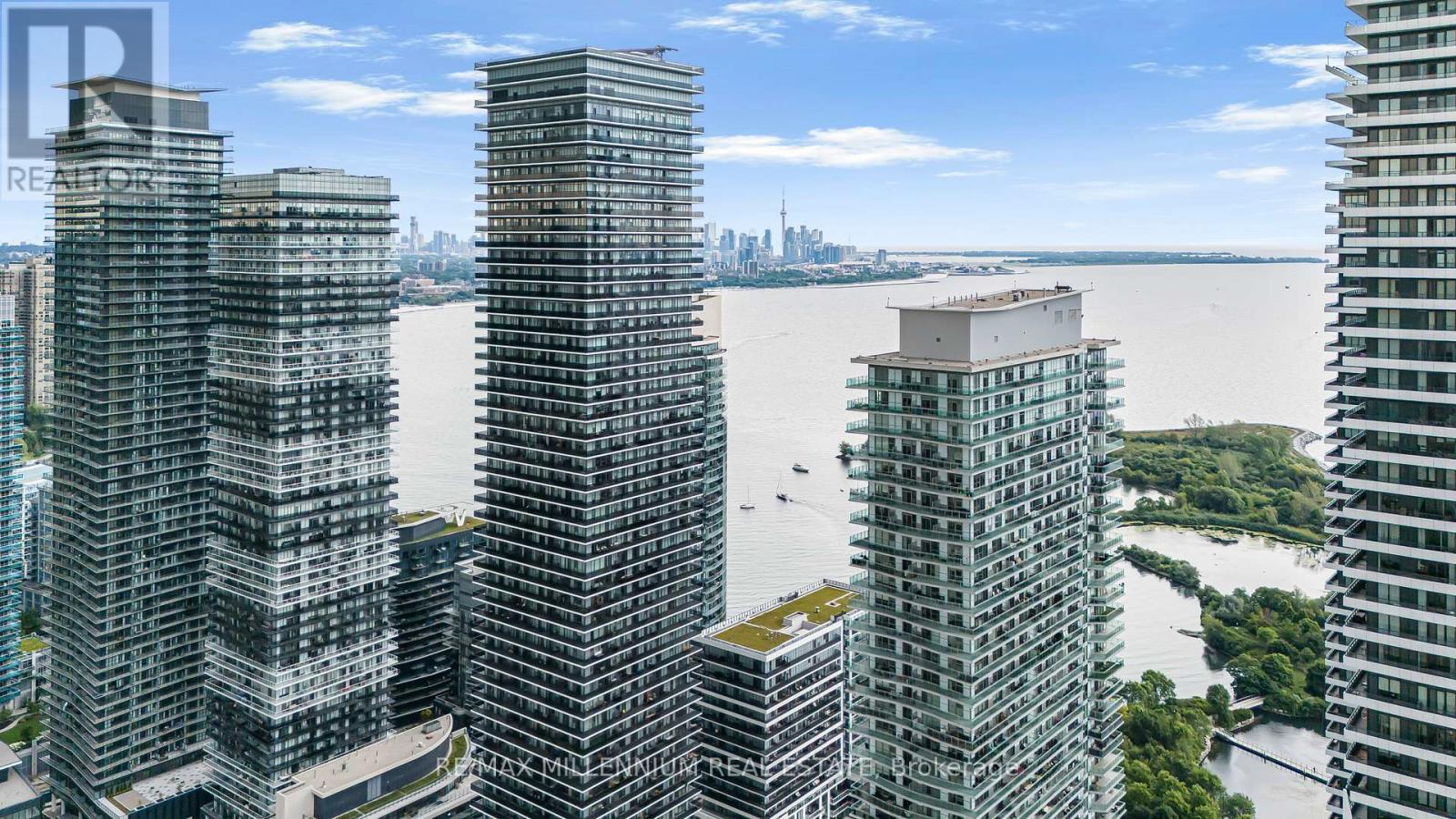 316 - 65 Annie Craig Drive N, Toronto, ON - Outdoor With Balcony With Facade