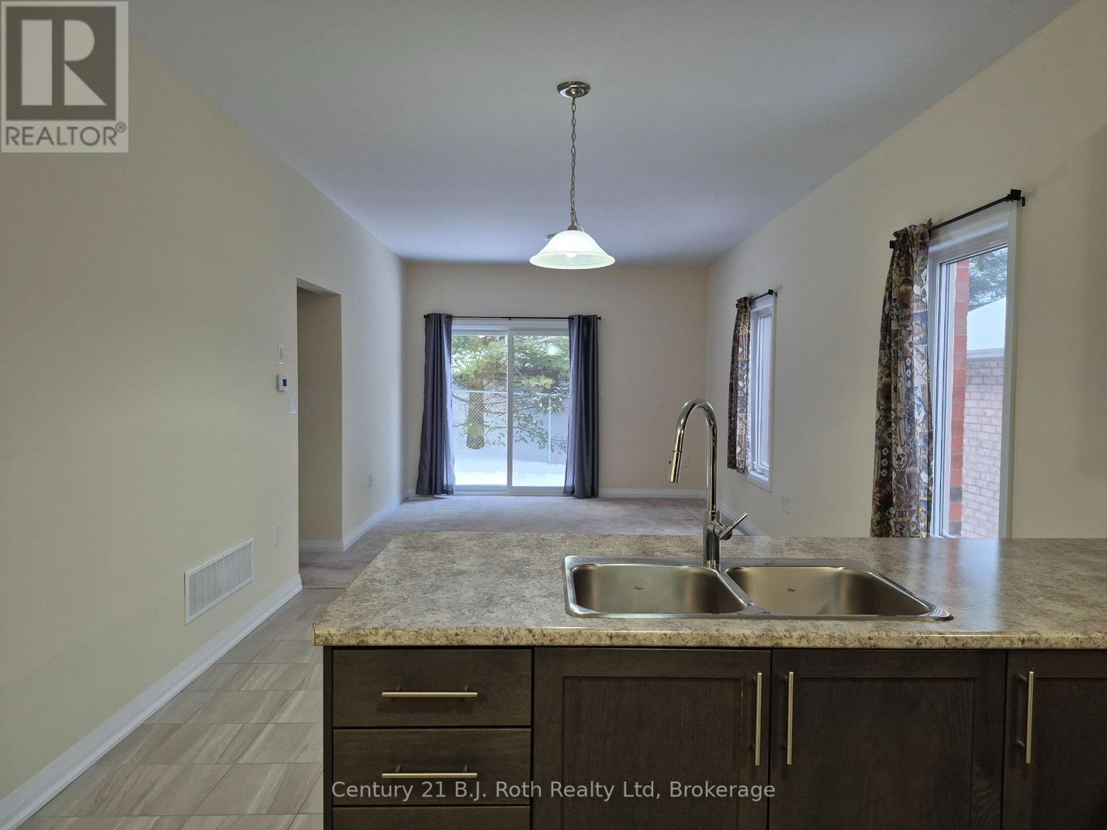 18 Revol Road, Penetanguishene, ON - Indoor Photo Showing Kitchen With Double Sink