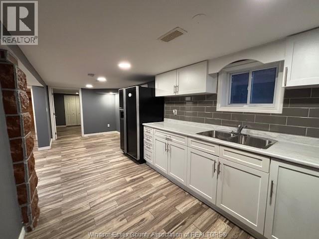 631 Pitt Street Unit# Lower, Windsor, ON - Indoor Photo Showing Kitchen With Double Sink