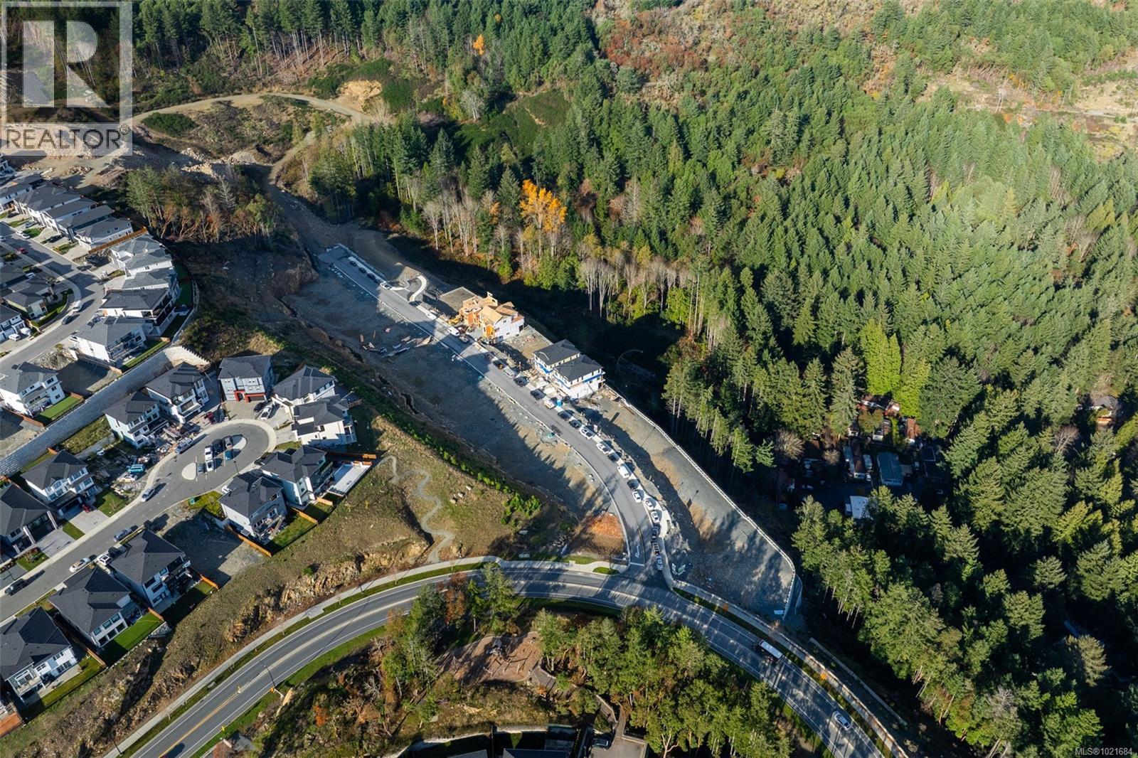 Aerial view of property's location with a heavily wooded area - 1204 Cedarbrook Way, Langford, BC