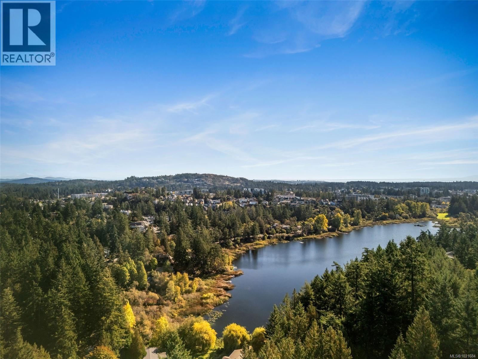 Aerial view of a nearby body of water and a forest - 1204 Cedarbrook Way, Langford, BC