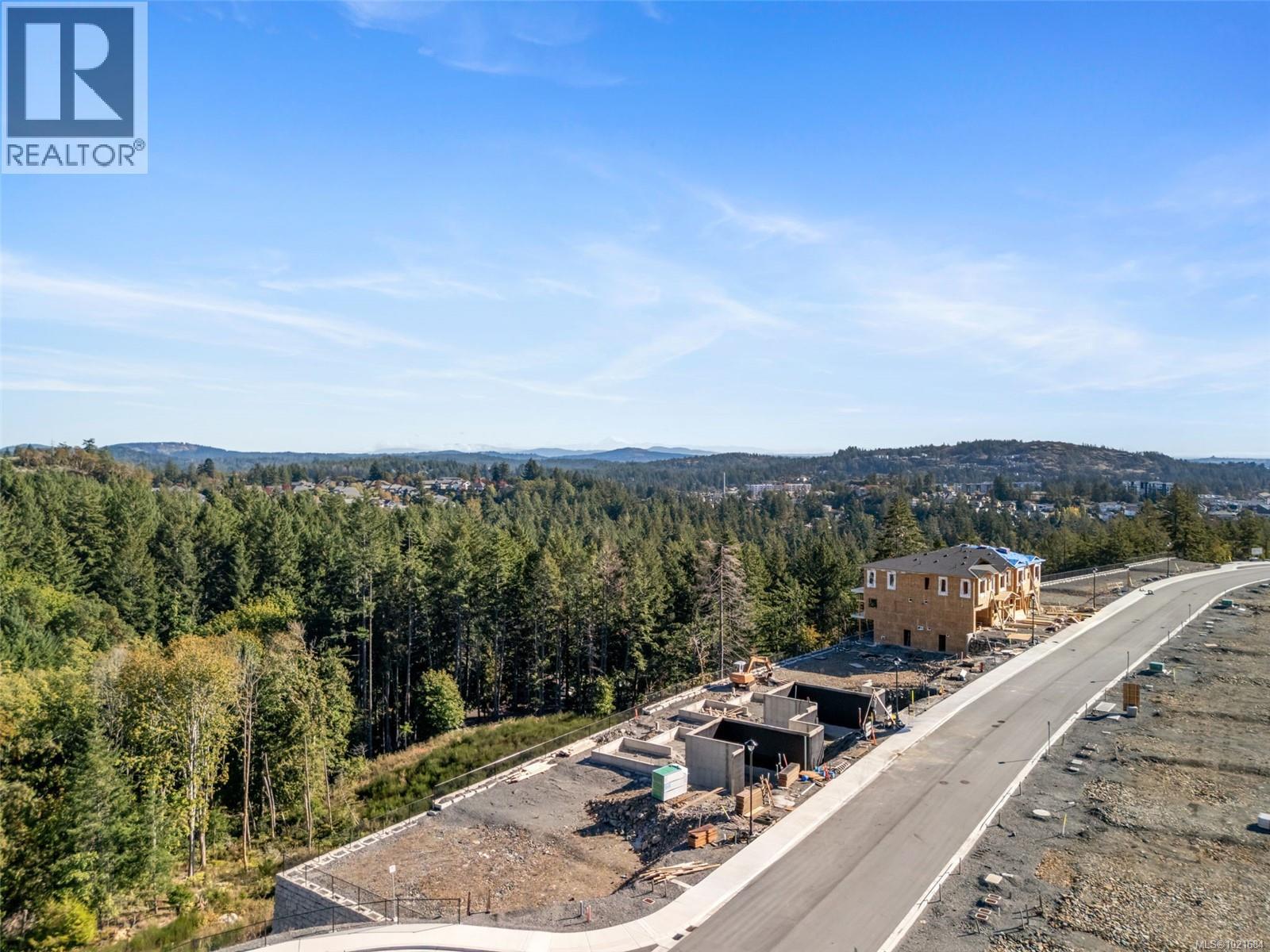 Drone / aerial view of a forest - 1204 Cedarbrook Way, Langford, BC
