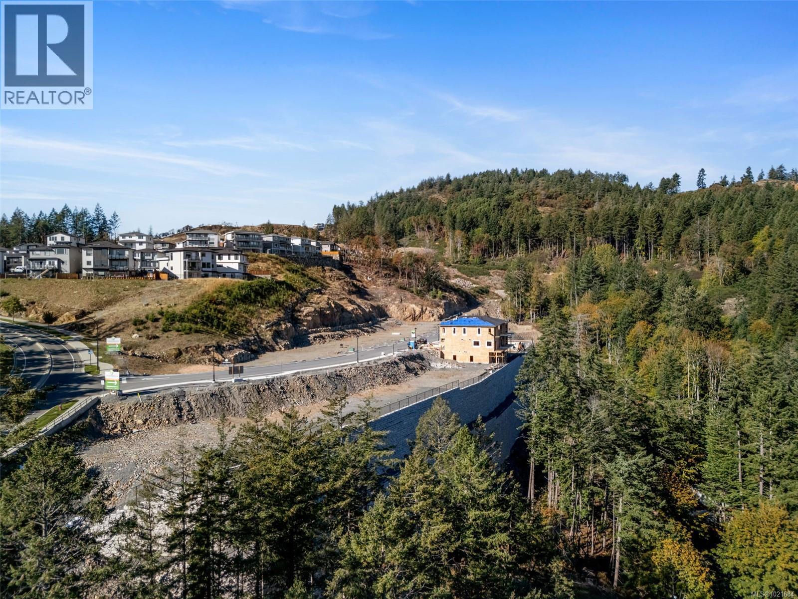 Aerial overview of property's location featuring a heavily wooded area - 1204 Cedarbrook Way, Langford, BC