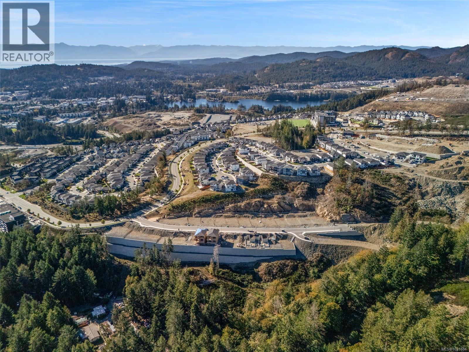 Aerial overview of property's location featuring a water and mountain view - 1204 Cedarbrook Way, Langford, BC