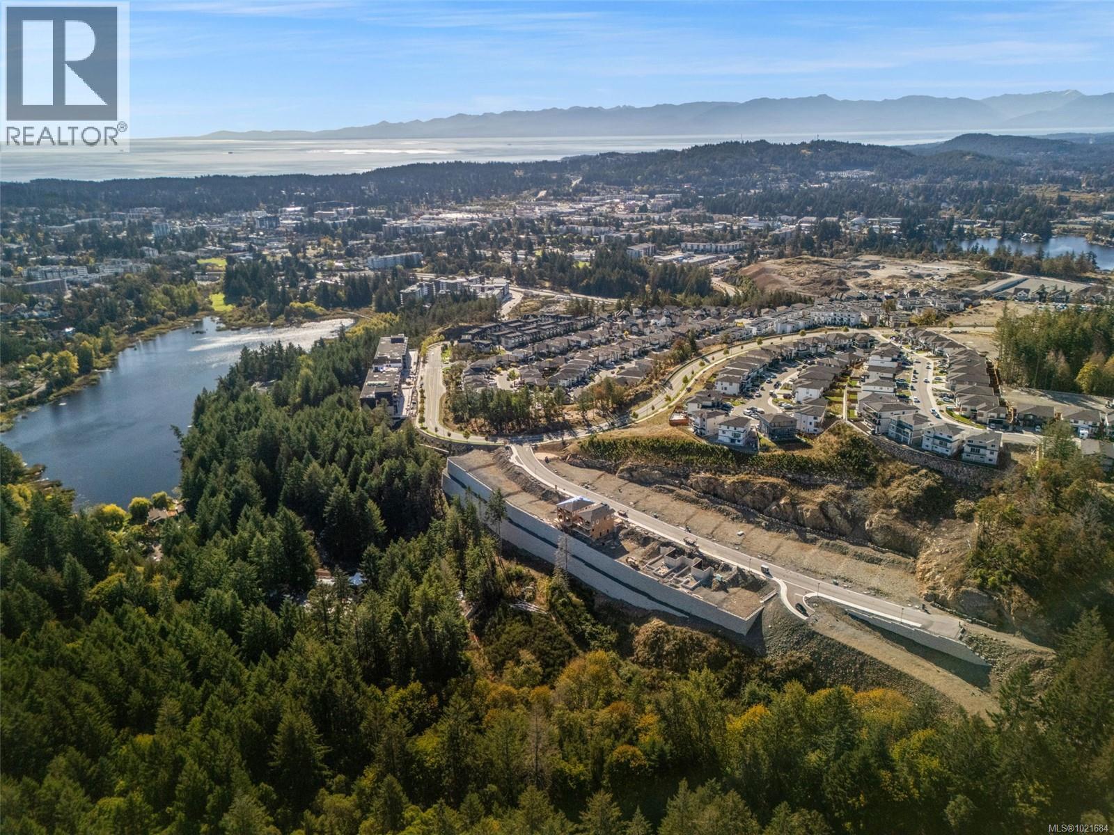 Aerial view of property's location with a water and mountain view - 1204 Cedarbrook Way, Langford, BC