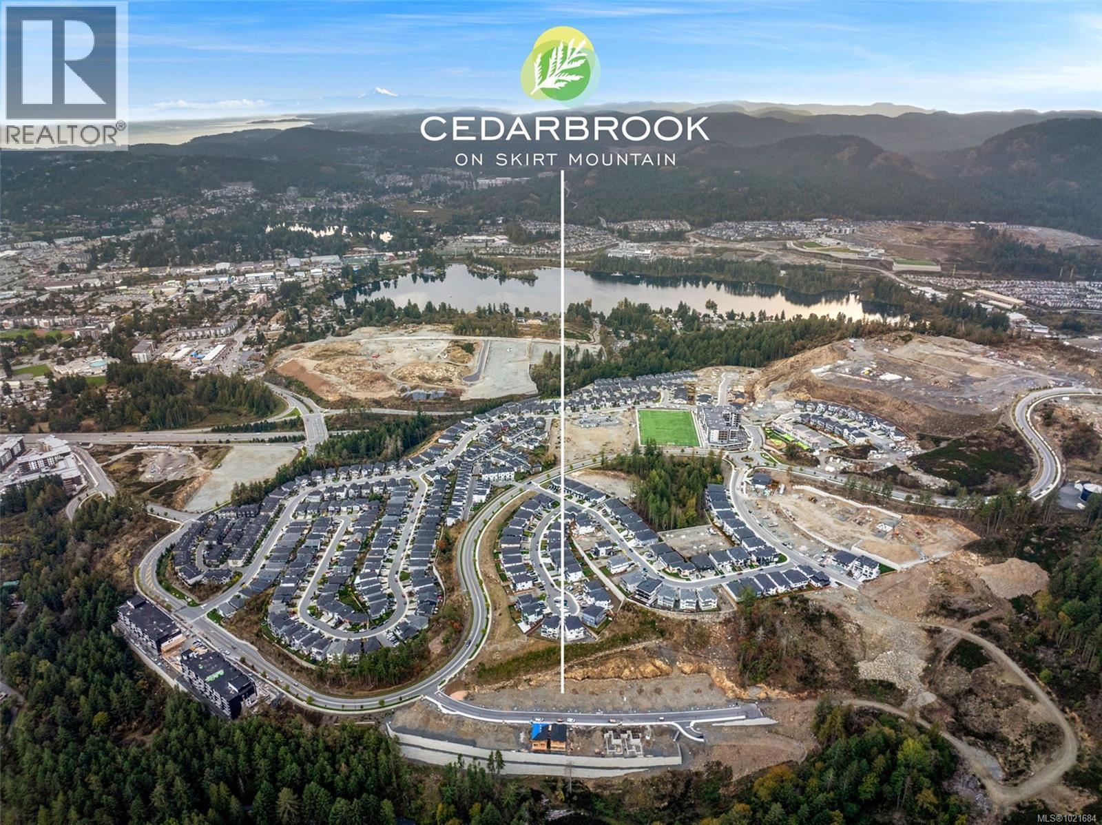 Aerial view of property and surrounding area featuring a water and mountain view - 1204 Cedarbrook Way, Langford, BC