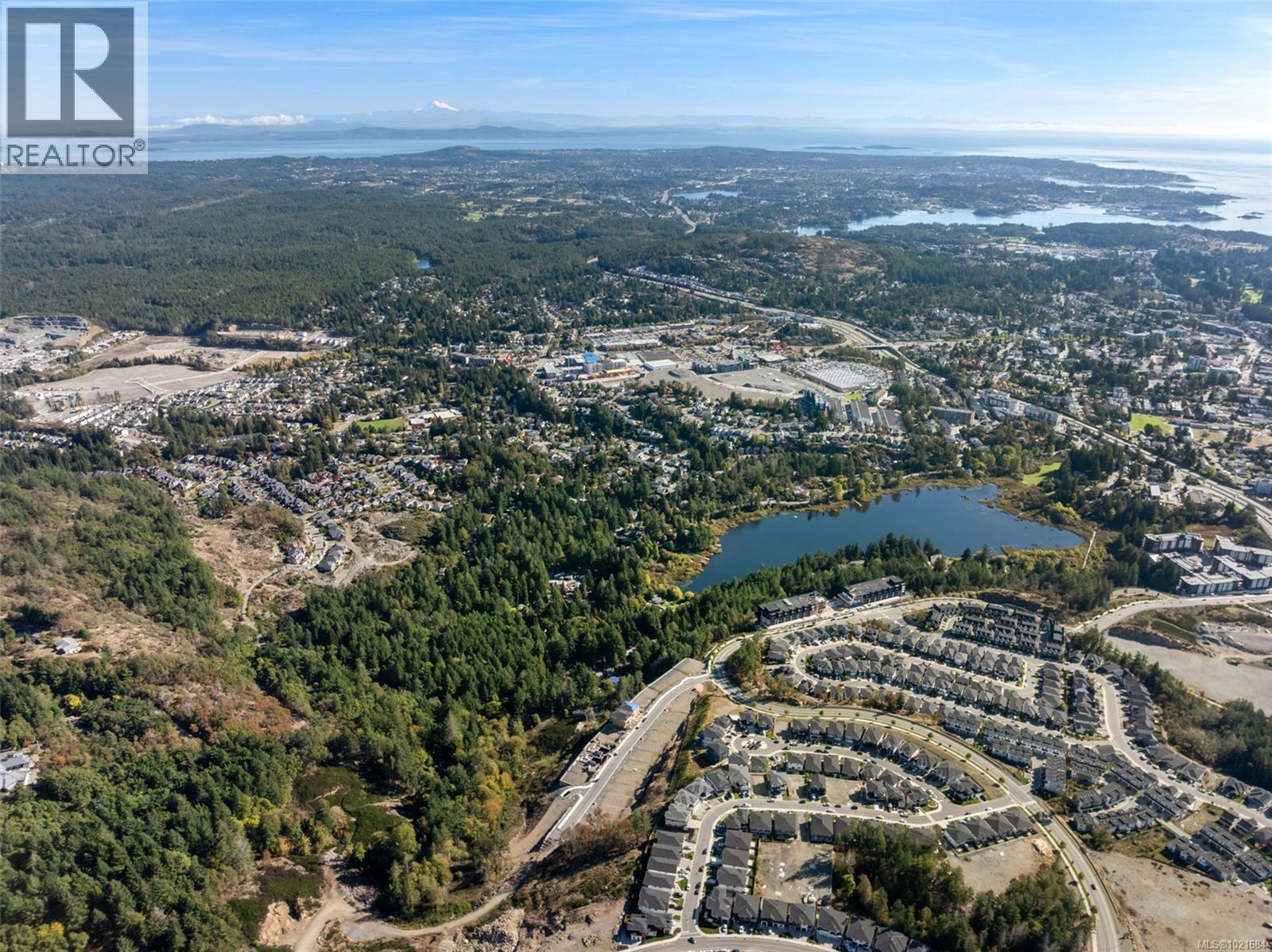 Aerial view of property's location with a large body of water - 1204 Cedarbrook Way, Langford, BC