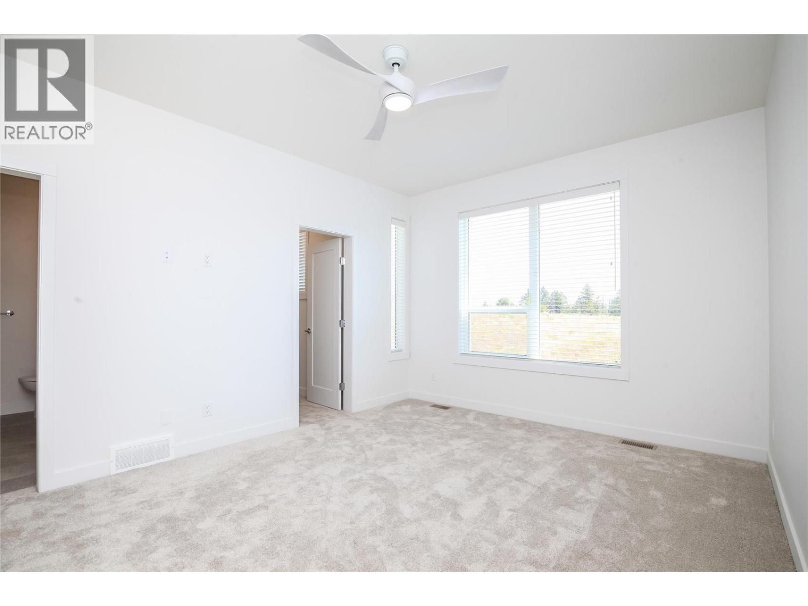 Similar Too - Primary Bedroom - 610 Academy Way Unit# 118, Kelowna, BC - Indoor Photo Showing Other Room