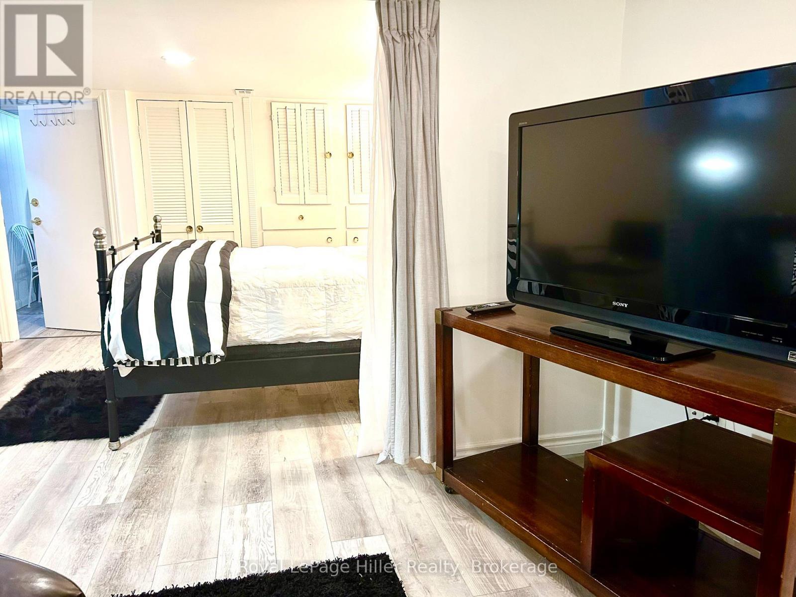 Living Room looking onto the Bedroom - Lower Unit - 82 Queen Street, Stratford, ON