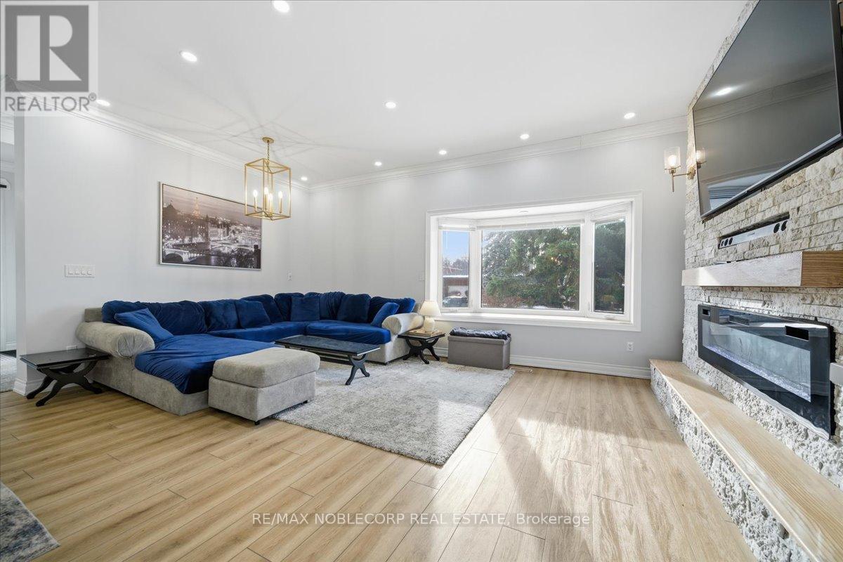 Main - 18 Florida Crescent, Toronto, ON - Indoor Photo Showing Living Room With Fireplace