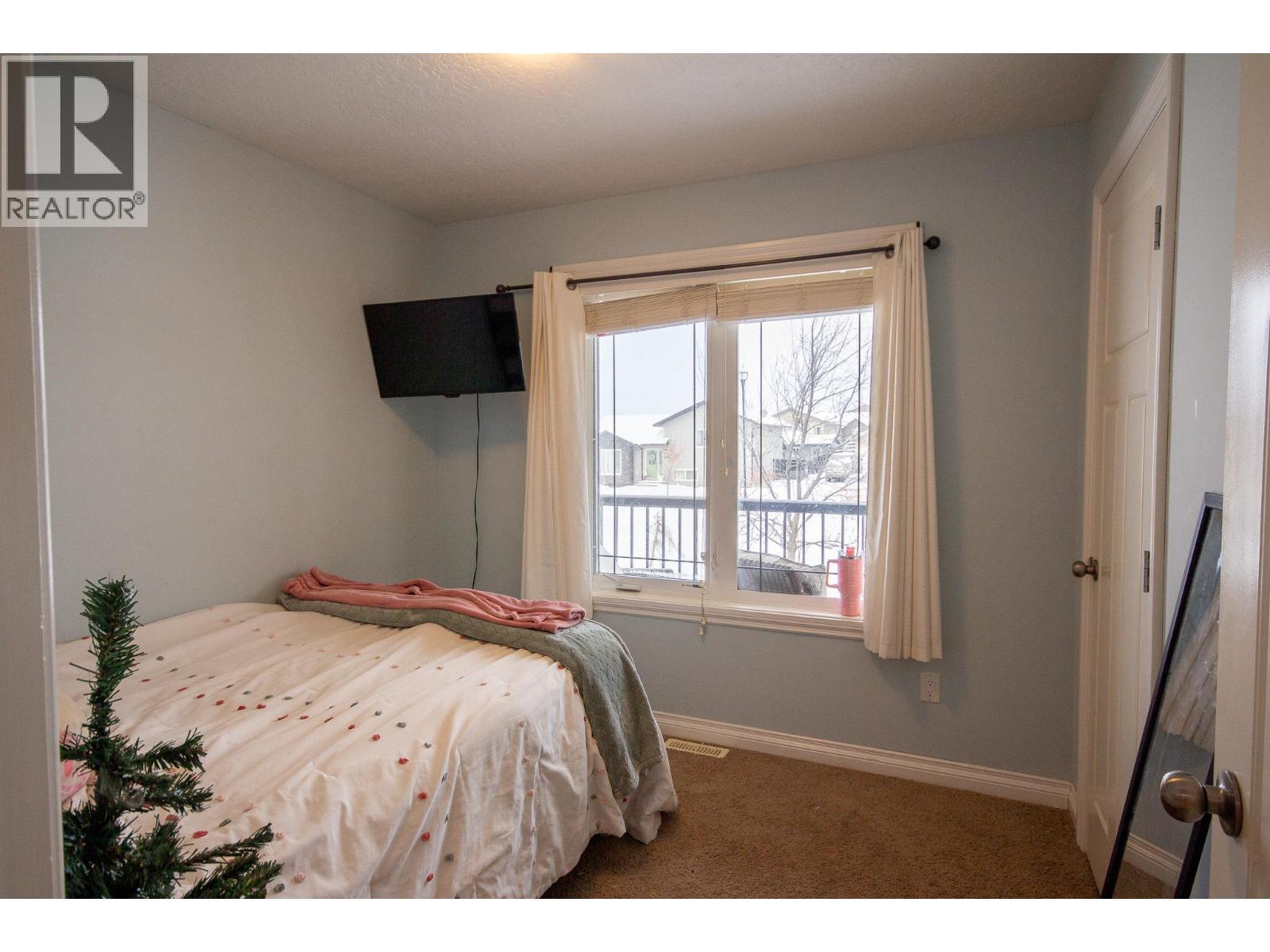 1717 87 Avenue, Dawson Creek, BC - Indoor Photo Showing Bedroom