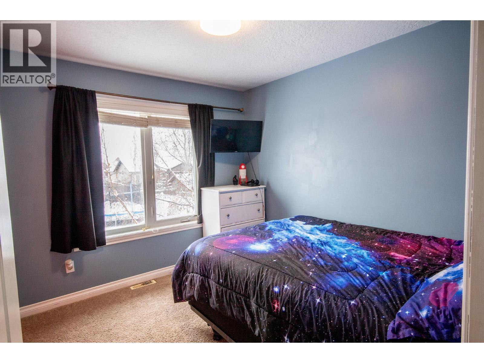1717 87 Avenue, Dawson Creek, BC - Indoor Photo Showing Bedroom