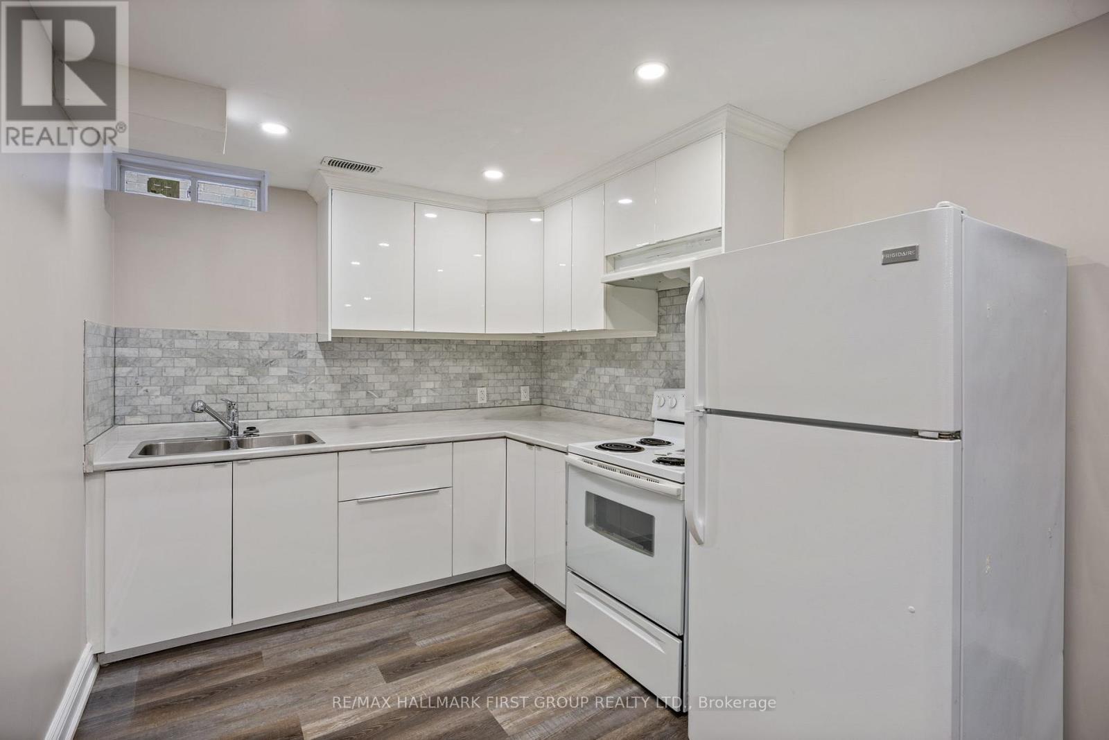 55 Buttonshaw Street, Clarington, ON - Indoor Photo Showing Kitchen With Double Sink
