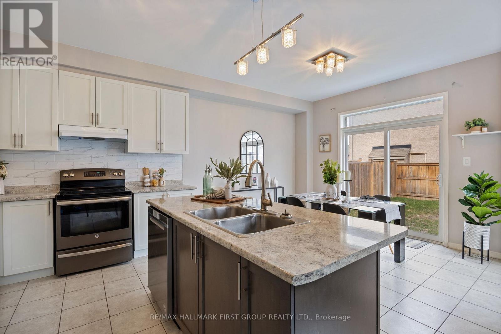 55 Buttonshaw Street, Clarington, ON - Indoor Photo Showing Kitchen With Double Sink