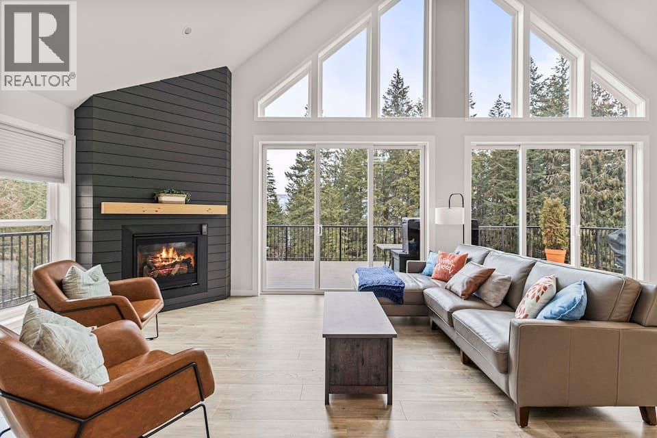 3040 Cedar Drive, Blind Bay, BC - Indoor Photo Showing Living Room With Fireplace
