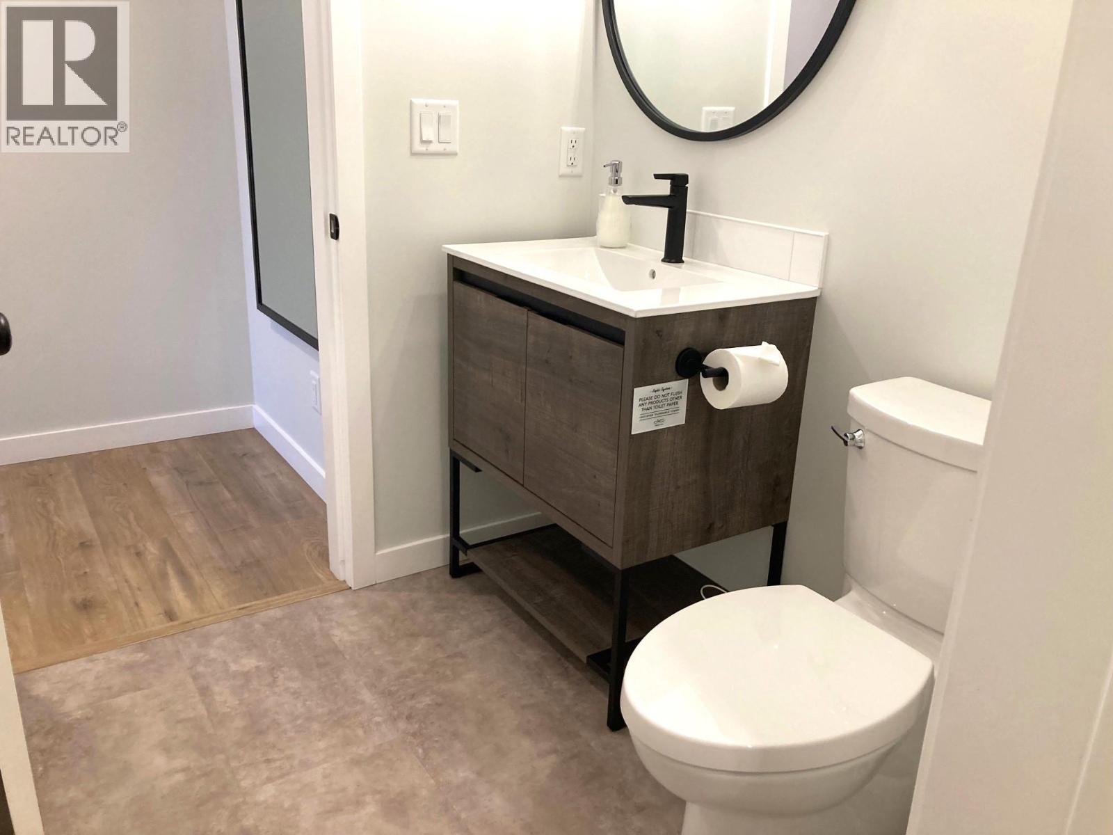 main floor 2 pc powder room - 3040 Cedar Drive, Blind Bay, BC - Indoor Photo Showing Bathroom