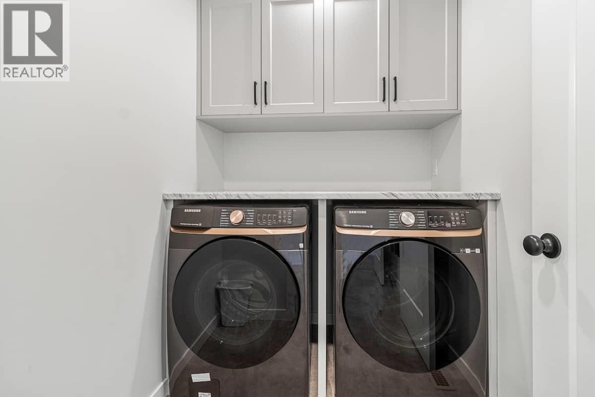 Laundry rm is on main floor - 3040 Cedar Drive, Blind Bay, BC - Indoor Photo Showing Laundry Room