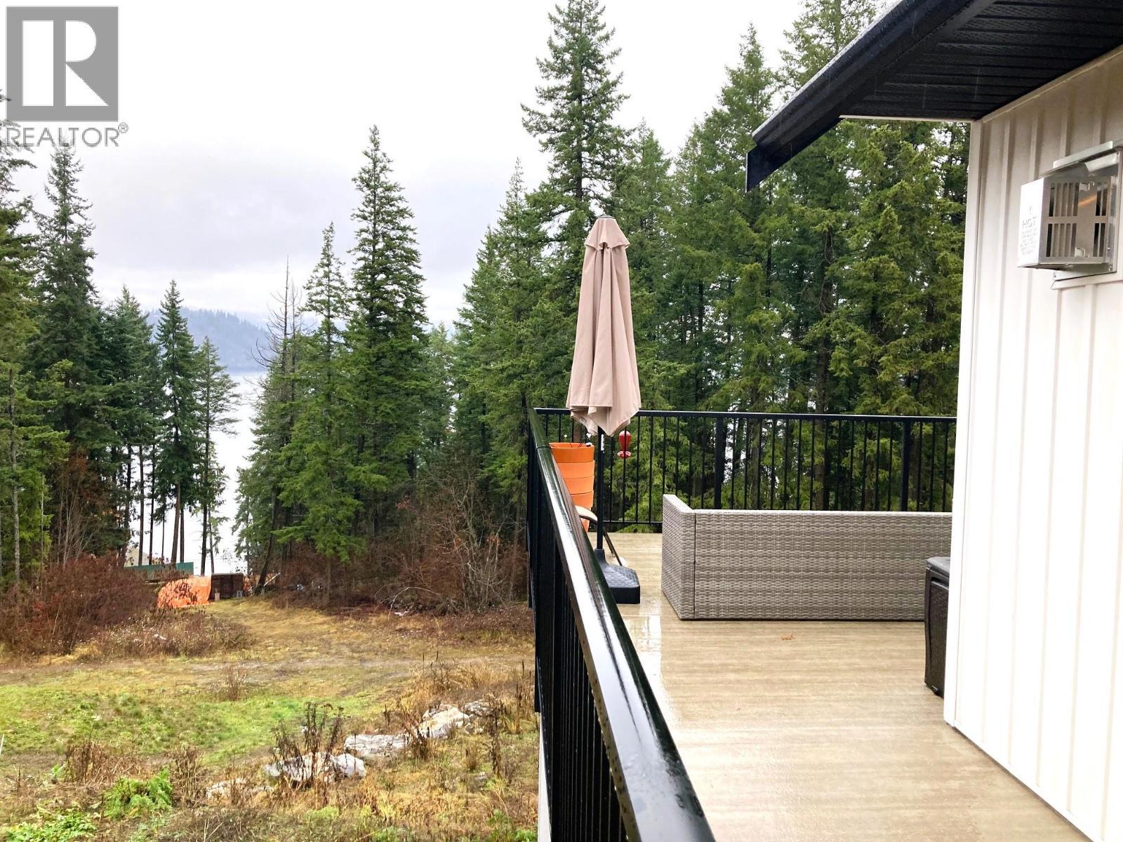 Peek a boo view of Copper Island on Shuswap Lake - 3040 Cedar Drive, Blind Bay, BC - Outdoor