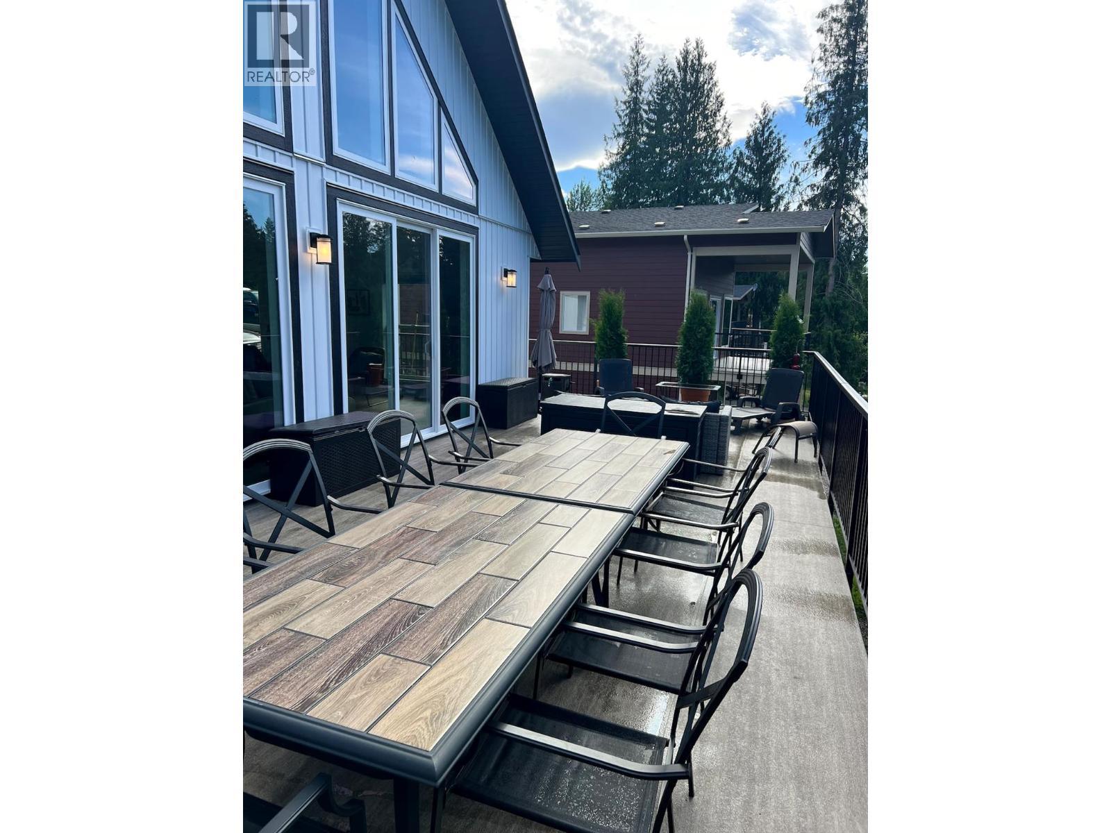 large sundeck - 3040 Cedar Drive, Blind Bay, BC - Outdoor With Deck Patio Veranda With Exterior