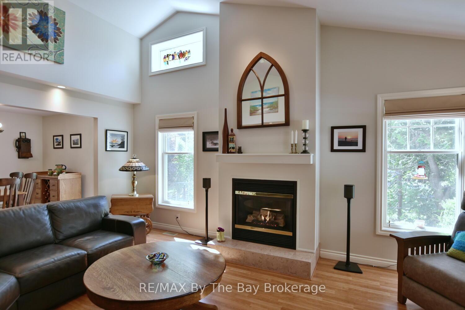 1327 River Road E, Wasaga Beach, ON - Indoor Photo Showing Living Room With Fireplace