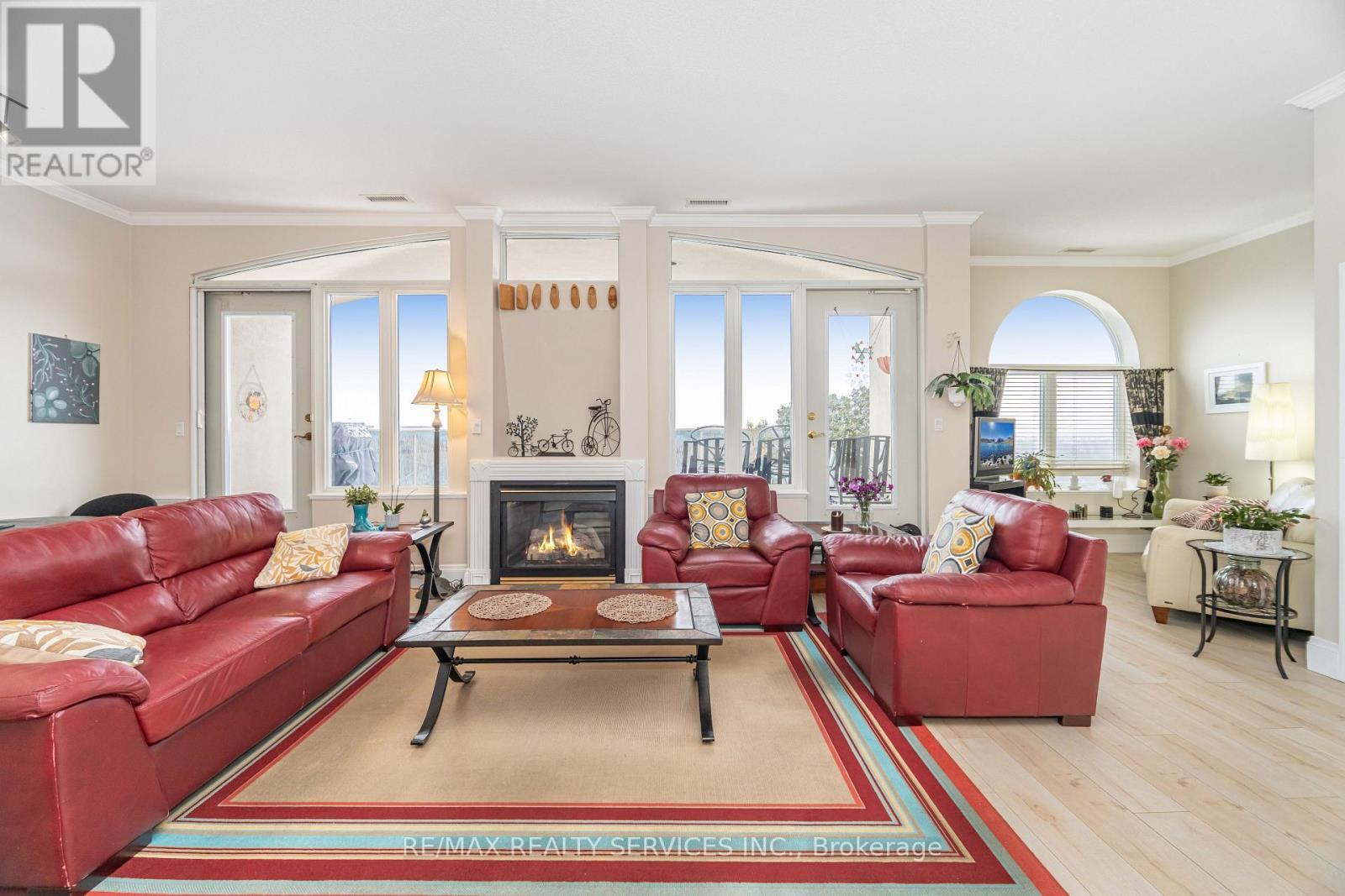 703 - 7 Dayspring Circle, Brampton, ON - Indoor Photo Showing Living Room With Fireplace