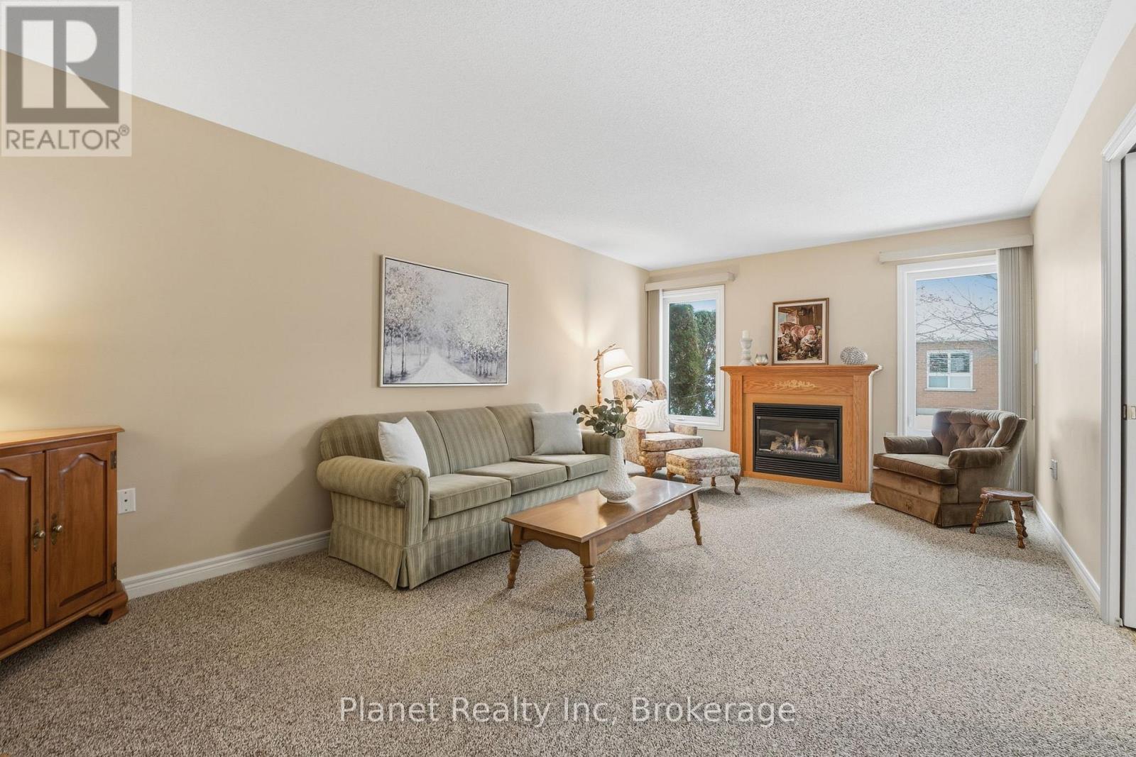 97 Basswood Drive, Guelph (Village By The Arboretum), ON - Indoor Photo Showing Living Room With Fireplace